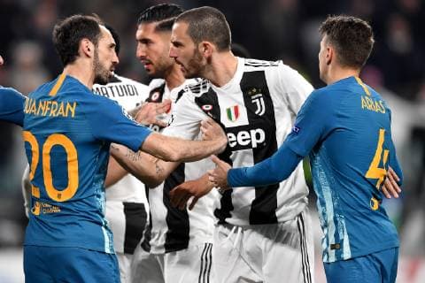 Juanfran of Atletico Madrid argues with Leonardo Bonucci of Juventus during the Uefa Champions League 2018 2019 round of 16 second leg football match between Juventus and Atletico Madrid at Juventus stadium, Turin, March, 12, 2019 Foto Andrea Staccioli Insidefoto andreaxstaccioli