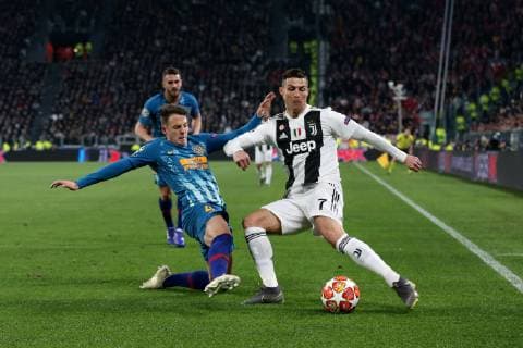 Cristiano Ronaldo of Juventus and Santiago Arias of Atletico Madrid during the UEFA Champions League Round of 16 match at the Allianz Stadium, Turin, Italy. Picture date 12th March 2019. Picture credit should read: Jonathan Moscrop Sportimage EDITORIAL USE ONLY. No use with unauthorised audio, video, data, fixture lists, club league logos or live services. Online in-match use limited to 120 images, no video emulation. No use in betting, games or single club league player publications. SOLO0805.JPG