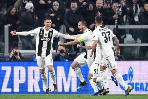 Cristiano Ronaldo of Juventus celebrates with team mates after scoring goal of 2-0 during the Uefa Champions League 2018 2019 round of 16 second leg football match between Juventus and Atletico Madrid at Juventus stadium, Turin, March, 12, 2019 Foto Andrea Staccioli Insidefoto andreaxstaccioli
