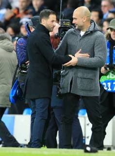 12th March 2019, Etihad Stadium, Manchester, England; UEFA Champions League football, round of 16, 2nd leg, Manchester City versus FC Schalke; FC Schalke manager Domenico Tedesco and Manchester City manager Pep Guardiola shake hands at the final whistle  ActionPlus12114085 DavidxBlunsden