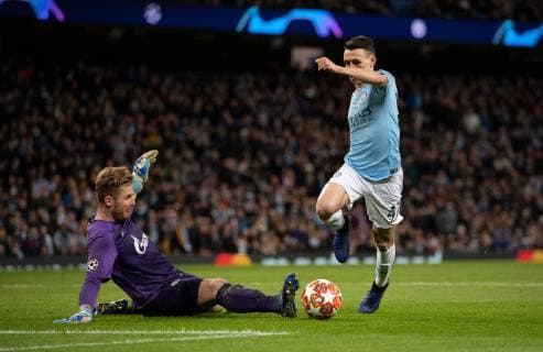 Manchester City v FC Schalke 04 UEFA Champions League Phil Foden of Manchester City goes round Schalke goalkeeper Ralf Fahrmann before making it 6-0 during the UEFA Champions League match at the Etihad Stadium, Manchester Content Not Available For UK Newspapers Copyright: xRussellxHartx FIL-12984-0051