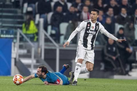 Cristiano Ronaldo dos Santos Aveiro (Juventus) Diego Roberto Godin Leal (Atletico de Madrid) during the Uefa Champions League Round of 16 - 2nd Leg match between Juventus 3-0 Atletico de Madrid at Allianz Stadium on March 12, 2019 in Torino , Italy. Noxthirdxpartyxsales  (99023141)