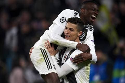 March 12, 2019 - Turin, Italy - Juventus striker CRISTIANO RONALDO, bottom, celebrates with teammate BLAISE MATUIDI after scoring against Atletico Madrid during Champions League action at Stadio Allianz Stadium. Ronaldo s hat-trick in the match propels Juventus past Atletico and into the Champions League quarter-finals. Soccer 2019: Juventus 3:0 Atletico Madrid  - ZUMAn230 20190312_zaa_n230_563 Copyright: xJosexBretonx