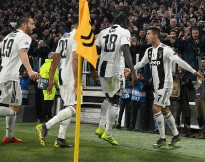 (190313) -- TURIN, March 13, 2019 (Xinhua) -- Juventus s Cristiano Ronaldo (R) celebrates after scoring during the UEFA Champions League round 16 second leg match between Juventus and Atletico Madrid in Turin, Italy, Mar.12, 2018. Juventus won 3-0. (Xinhua Alberto Lingria) (SP)ITALY-TURIN-SOCCER-UEFA CHAMPIONS LEAGUE-JUVENTUS VS ATLETICO MADRID 