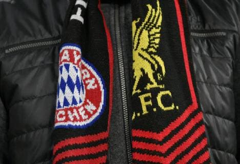 Before game start Fan scarves FCB FC Liverpool logo Emblem Champions League CL Round of sixteen return FC Bayern Munich FCB vs FC Liverpool 13 03 2018 DFL REGULATIONS PROHIBIT ANY USE OF PHOTOGRAPHS AS IMAGE SEQUENCES AND OR QUASI VIDEO FC Bayern Munich FCB vs FC Liverpool