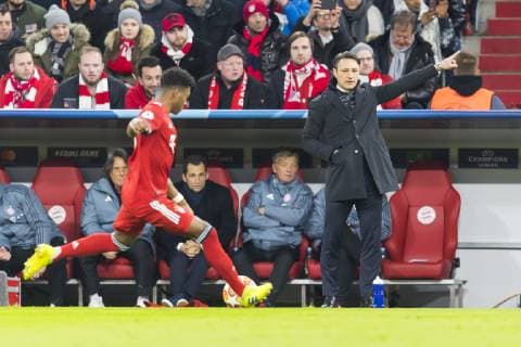 GER UEFA CL FC Bayern Muenchen GER vs. FC Liverpool GBR 13 03 2019 Allianz Arena Muenchen GER UEFA CL FC Bayern Muenchen GER vs. FC Liverpool GBR Round of 16 UEFA regulations prohibit any use of photographs as image sequences and or quasi video in picture David Alaba FCB 27 gets the direction of Niko Kovac head coach FCB nordphotox xStraubmeier nph00004