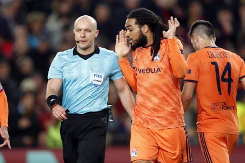 (l-r) referee Szymon Marciniak, Jason Denayer of Olympique Lyonnais during the UEFA Champions League round of 16 match between FC Barcelona Barca and Olympique Lyonnais at Camp Nou on March 13, 2019 in Barcelona, Spain UEFA Champions League 2018 2019 xVIxVIxImagesx xMauricexvanxSteenxIVx 13897800