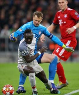 SOCCER - CL, Bayern vs Liverpool MUNICH,GERMANY,13.MAR.19 - SOCCER - UEFA Champions League, round of 16, FC Bayern Muenchen vs Liverpool FC. Image shows Sadio Mane (Liverpool) and Manuel Neuer (Bayern). GEPAxpictures xThomasxBachun