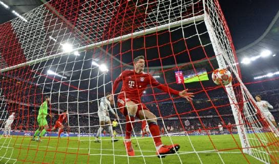 13 03 2019 Football UEFA Champions League 2018 2019 Round of sixteen return FC Bayern Munich FC Liverpool at Allianz Arena Munich 1 1 equaliser own goal Joel Matip mitte FC Liverpool re Robert Lewandowski FC Bayern München li goalkeeper Alisson FC Liverpool DFL and DFB regulations prohibit any use of photographs as image sequences and or quasi video