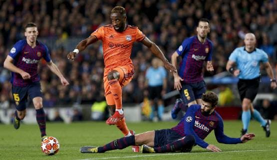 Barcelona x Lyon BARCELONA, CA - 13.03.2019: BARCELONA X LYON - Dembele shares with Piqué during the match between Barcelona and Lyon held at the Camp Nou in Barcelona, CA. The match is the second qualifying round of the UEFA Champions League 2018 19 Round of 16. (Photo: Marco Galvão Fotoarena) x1697688x  MarcoxGalvão