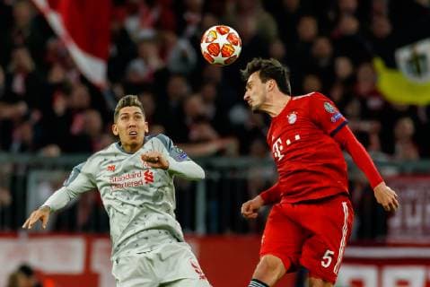 Germany Muenchen 13 03 2019 UEFA Champions League 2018 19 Season Round of 16 Second leg FC Bayern Muenchen Liverpool FC Roberto Firmino LFC and Mats Hummels FCB in the duel DeFodi048