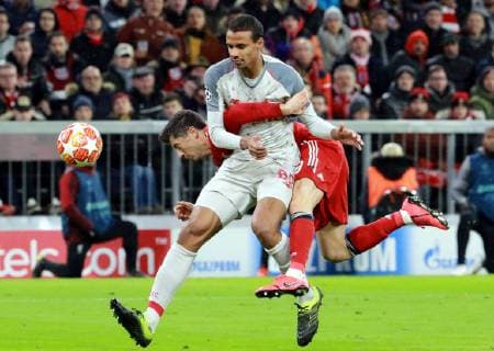 Robert Lewandowski FC Bayern stopped by Joel Matip Liverpool FC Football UEFA Champions League FC Bayern Munich AEK Athens FC 13 03 2019