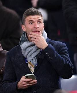 FOOTBALL CHAMPIONS LEAGUE SAISON 2018 2019 2019 ACHTELFINAL RUECKSPIEL FC Bayern Muenchen FC Liverpool 13 03 2019 Thomas Mueller li FC Bayern Muenchen on the tribune thoughtfully