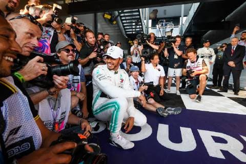 March 16, 2019 - Melbourne, Victoria, Australia - Lewis Hamilton of Great Britain and Mercedes takes a photo with photographers after taking pole position for the Australian Formula 1 Grand Prix at Albert Park on March 16, 2019 in Melbourne, Australia Australian F1 Grand Prix - Qualifying  - ZUMAn230 20190316_zaa_n230_057 Copyright: xMorganxHancockx