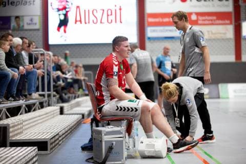 Lübbecke Germany 16 03 2019 2 Handball Bundesliga 2018 2019 TuS N Lübbecke vs Handball Sportverein Hamburg M Dominik Vogt Hamburg injured Lübbecke Nordrhein Westfalen Germany Merkur Arena