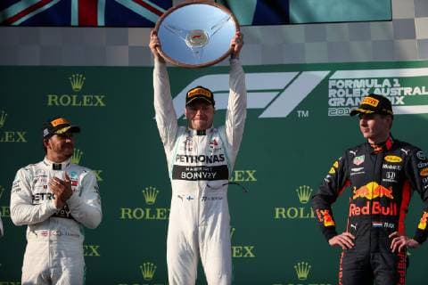(190317) -- MELBOURNE, March 17, 2019 -- First-placed Mercedes driver Valtteri Bottas of Finland (C) celebrates with his trophy beside second-placed Mercedes driver Lewis Hamilton (L) of Britain and third-placed Red Bull driver Max Verstappen of the Netherlands during the awarding ceremony of Formula 1 Australian Grand Prix 2019 at the Albert Park in Melbourne, Australia, March 17, 2019. ) (SP)AUSTRALIA-MELBOURNE-F1-GRAND PRIX 2019 BaixXuefei 