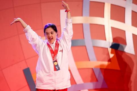 March 17, 2019 - Abu Dhabi, United Arab Emirates - Athlete shows her emotions when receiving their medals during declaration ceremony at the Special Olympics World Games in Abu Dhabi National Exhibition Centre, United Arab Emirates on March 17, 2019. Special Olympics is a worldwide organization which organize sports competitions for people with learning difficulties. Summer World Games take place every 4 years. 7500 athletes from nearly 200 countries compete in 24 Olympic disciplines in Abu Dhabi Games in 2019. Special Olympics In Abu Dhabi 2019  - ZUMAn230 20190317_zaa_n230_731 Copyright: xDominikaxZarzyckax