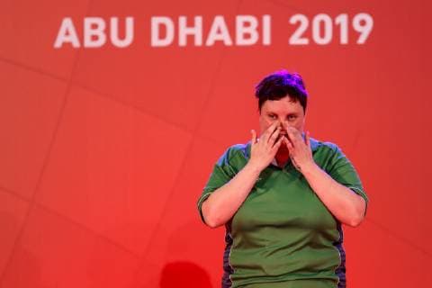 March 17, 2019 - Abu Dhabi, United Arab Emirates - Athlete from Ireland shows her emotions when receiving their medals during declaration ceremony at the Special Olympics World Games in Abu Dhabi National Exhibition Centre, United Arab Emirates on March 17, 2019. Special Olympics is a worldwide organization which organize sports competitions for people with learning difficulties. Summer World Games take place every 4 years. 7500 athletes from nearly 200 countries compete in 24 Olympic disciplines in Abu Dhabi Games in 2019. Special Olympics In Abu Dhabi 2019  - ZUMAn230 20190317_zaa_n230_720 Copyright: xDominikaxZarzyckax