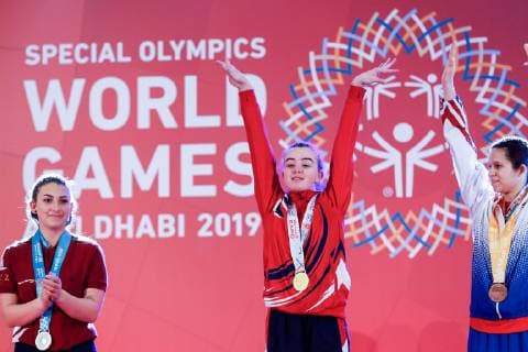 March 17, 2019 - Abu Dhabi, United Arab Emirates - Athletes show their emotions when receiving their medals during declaration ceremony at the Special Olympics World Games in Abu Dhabi National Exhibition Centre, United Arab Emirates on March 17, 2019. Special Olympics is a worldwide organization which organize sports competitions for people with learning difficulties. Summer World Games take place every 4 years. 7500 athletes from nearly 200 countries compete in 24 Olympic disciplines in Abu Dhabi Games in 2019. Opening Ceremony Of Special Olympics 2019 In Abu Dhabi  - ZUMAn230 20190317_zaa_n230_642 Copyright: xDominikaxZarzyckax