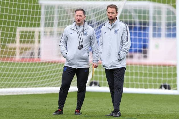Gareth Southgate (r) watches his players train during the England senior squad training session at St George s Park, Burton on Trent. Picture date 19th March 2019. Picture credit should read: James Wilson Sportimage EDITORIAL USE ONLY. No use with unauthorised audio, video, data, fixture lists, club league logos or live services. Online in-match use limited to 120 images, no video emulation. No use in betting, games or single club league player publications.