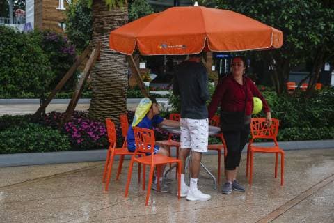 March 19, 2019 - Miami, Florida, USA - Fans leave the Hard Rock Stadium after all play is canceled for the day due to rain on the second day of the Miami Open. Miami Open - ZUMAd151 20190319_znp_d151_002 Copyright: xAdamxDelGiudicex