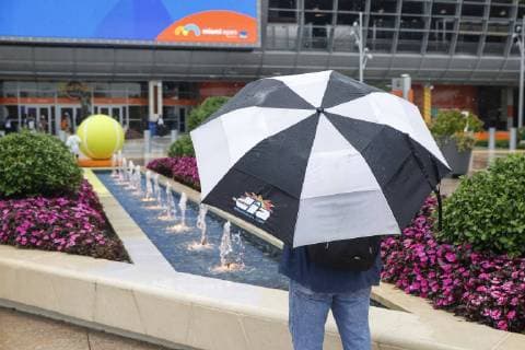 March 19, 2019 - Miami, Florida, USA - Fans leave the Hard Rock Stadium after all play is canceled for the day due to rain on the second day of the Miami Open. Miami Open - ZUMAd151 20190319_znp_d151_003 Copyright: xAdamxDelGiudicex