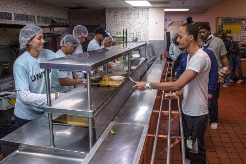 Spanish tennis players Garbine Muguruza (L) and David Ferrer (2L) serve food at a soup kitchen, in Miami, Florida, United States, 19 March 2019, where they took part in a solidary initiative to feed people in need. David Ferrer and Muguruza participate in charity in Miami !ACHTUNG: NUR REDAKTIONELLE NUTZUNG!  Copyright: xGiorgioxVierax AME9011 20190319-636886316878838271