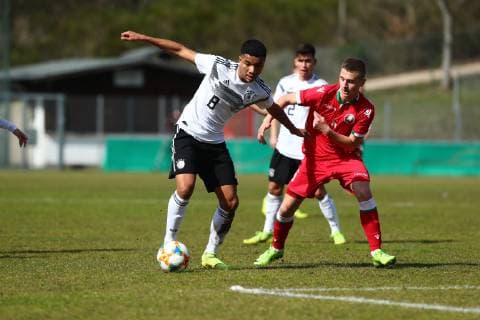 Malik Tillman Germany in duel with Vladislav Sychev Belarus Germany vs Belarus U17 EM qualification 20 03 2019 DFB regulations prohibit any use of photographs as image sequences and or quasi video Germany vs Belarus U17 EM qualification 20 03 2019 Idar Oberstein Copyright: xEibner-Pressefotox