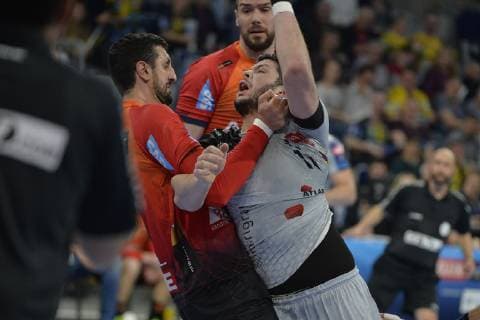 Rhein Neckar Loewen HBC Nantes 11 by Nantes Tournat against Rhein Neckar Loewe Momir Rnic No 20 at the match in the Champions League Round of 16 Rhein Neckar Loewen HBC Nantes Mannheim 20 03 19 Handball Round of 16 Champions League Mannheim Baden Wuerttemberg Germany SAP Arena