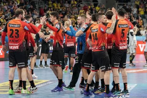 Player of the Rhein Neckar Lions restrained cheering after the end of the game there had been more in it cheering after the final whistle victory winner winner cheers cheers joy optimistic highlight action action handball champions League Rhein Neckar Lions HBC Nantes xozx