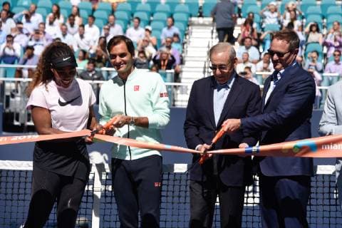 MIAMI GARDENS, FL - MARCH 20: Serena Williams, left, Roger Federer and Stephen Ross attend the ribbon cutting for Stadium Court at the Miami Open on March 20, 2019 at Hard Rock Stadium in Miami Gardens, FL. (Photo by Michele Eve Sandberg Icon Sportswire) TENNIS: MAR 20 Miami Open Icon190320096