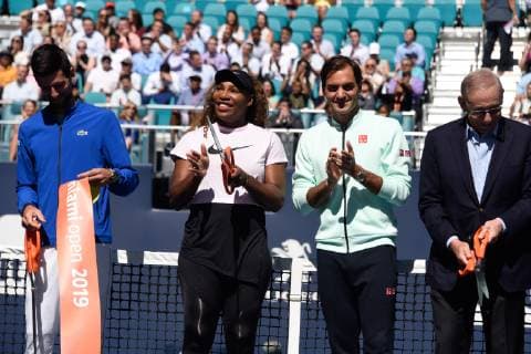 MIAMI GARDENS, FL - MARCH 20: Novak Djokovic, from left, Serena Williams, Roger Federer and Stephen Ross attend the ribbon cutting for Stadium Court at the Miami Open on March 20, 2019 at Hard Rock Stadium in Miami Gardens, FL. (Photo by Michele Eve Sandberg Icon Sportswire) TENNIS: MAR 20 Miami Open Icon190320100