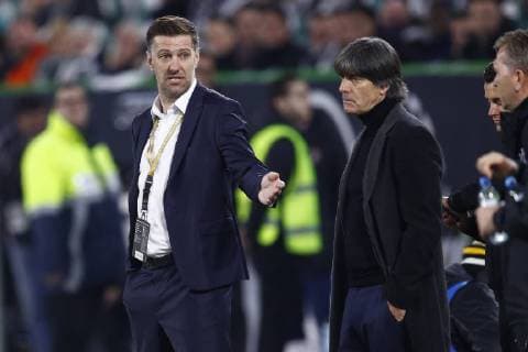 20 03 2019 Volkswagen Arena Wolfsburg Testspiel Deutschland GER vs. Serbia SRB in picture Mladen Krstajic Trainer Serbia apologizes to Joachim Loew National Coach of the national team after the foul on Leroy Sane 19 Germany Important Note The DFB prohibits the use of sequence images on the Internet and in online media during the match including half time Embargo period The DFB allows the publication and further use of the images on mobile devices, especially MMS and via DVB H and DMB only after the end of the match Germany vs. Serbia