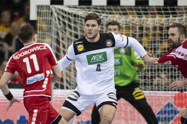 Johannes GOLLA GER Mi in action pulls Alen MILOSEVIC SUI r on jersey at his first international Debuet Debuetant Debutant Debutant Debutant Scene Handball Mens Friendly match Germany GER Switzerland SUI 27 29 in Duesseldorf Germany on 09 03 2019