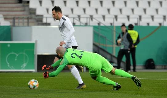 Football Germany Men Season 2018 2019 Stadion Essen International match U21 Germany white France blue Lebin Öztunali GER scores goal to 1-0 against Paul Bernardoni FRA Action UEFA REGULATIONS PROHIBIT ANY USE OF PHOTOGRAPHS AS IMAGE SEQUENCES AND OR QUASI VIDEO