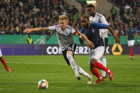 v l Timo Baumgartl Germany and Moussa Dembele France in the duel Football U21 international Germany vs France Essen Stadium Hafenstrasse 21 03 2019 DFB regulations prohibit any use of photographs as image sequences and or quasi video Essen Stadium Hafenstrasse NRW Germany