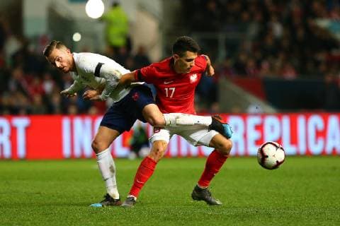Bartosz Kapustka of Poland U21s and James Maddison of England U21s during the International Friendly Länderspiel match between England U21 U 21 and Poland U21 at Ashton Gate, Bristol, England on 21 March 2019. Copyright: xDavexPetersx 23440046