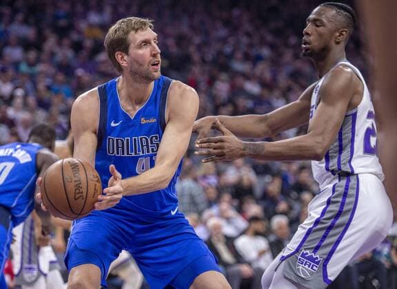 March 21, 2019 - Sacramento, CA, USA - The Dallas Mavericks Dirk Nowitzki (41) rebounds the ball against the Sacramento Kings Harry Giles III (20) on Thursday, March 21, 2019, at the Golden 1 Center in Sacramento, Calif. Dallas at Sacramento - ZUMAm67_ 20190321_zaf_m67_090 Copyright: xHectorxAmezcuax