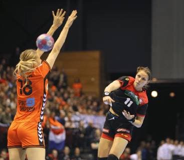 Photo Xenia Smits Germany throws against Kelly Dulfer left handball international on Fr 22 03 2019 in Groningen Netherlands Germany