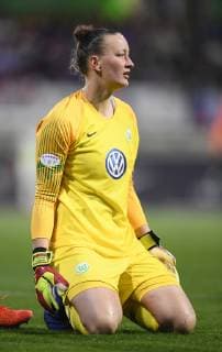 Goalkeeper Almuth Schult VfL kneels on the ground Football UEFA Championsleague Season 2018 2019 Quarter-final return match VfL Wolfsburg Olympique Lyon in Wolfsburg Germany 27 03 2019