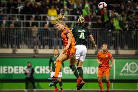 GER UWCL quarter finals VfL Wolfsburg vs Olympique Lyon 27 03 2019 AOK Stadium Wolfsburg GER UWCL quarter finals VfL Wolfsburg vs Olympique Lyon UEFA REGULATIONS PROHIBIT ANY USE OF PHOTOGRAPHS AS IMAGE SEQUENCES AND OR QUASI VIDEO picture shows header duel between Ada Stolsmo Hegerberg Lyon 14 and Nilla Fischer VfL Wolfsburg 4 nordphotox xRauch nph00251
