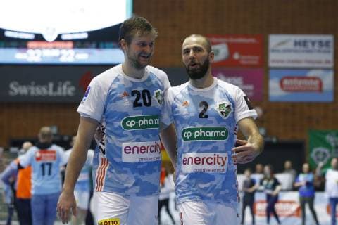 27 03 2019 Swiss Life Hall Hannover EHF Cup Group Phase TSV Hannover Burgdorf vs. RK Nexe HRV in picture Fabian Boehm 20 Han Burgdorf and Torge Johannsen 2 Han Burgdorf cheer after victory TSV Hannover Burgdorf vs. RK Nexe