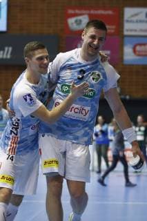 27 03 2019 Swiss Life Hall Hannover EHF Cup Group Phase TSV Hannover Burgdorf vs. RK Nexe HRV in picture Vincent Buechner 74 Han Burgdorf and Nejc Cehte 3 Han Burgdorf cheer for victory TSV Hannover Burgdorf vs. RK Nexe