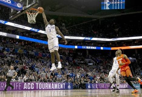 March 14, 2019 - Charlotte, NC, USA - Duke s Zion Williamson (1) glides to the basket for a dunk in the opening minutes of play against Syracuse in the quarterfinals of the ACC Tournament at the Specturm Center in Charlotte, N.C., on Thursday, March 14, 2019. Final Four ticket buying scramble intensifies with potential for Zion Williamson in Minneapolis - ZUMAm67_ 20190314_zaf_m67_027 Copyright: xRobertxWillettx