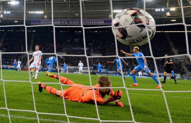 Sport Bilder des Tages 29.03.2019, xfux, Fussball 1.Bundesliga, TSG 1899 Hoffenheim - Bayer 04 Leverkusen, emspor, v.l. Lukas Hradecky (Bayer 04 Leverkusen), Ishak Belfodil (TSG 1899 Hoffenheim) Goal scored, Tor zum 1:0 (DFL DFB REGULATIONS PROHIBIT ANY USE OF PHOTOGRAPHS as IMAGE SEQUENCES and or QUASI-VIDEO) Sinsheim *** 29 03 2019 xfux Football 1 Bundesliga TSG 1899 Hoffenheim Bayer 04 Leverkusen emspor v l Lukas Hradecky Bayer 04 Leverkusen Ishak Belfodil TSG 1899 Hoffenheim Goal scored Goal to 1 0 DFL DFL REGULATIONS PROHIBIT ANY USE OF PHOTOGRAPHS as IMAGE SEQUENCES and or QUASI VIDEO Sinsheim