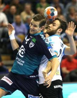 31 03 2019 Handball EHF Cup Group A 12 Matchday Foxes Berlin Balatonfüredi KSE Picture v l Bjarki Mar Elisson Foxes Berlin vs. Zoltan Szita Balatonfüredi KSE Handball EHF Cup Group A 12 Matchday Foxes Berlin Balatonfüredi KSE