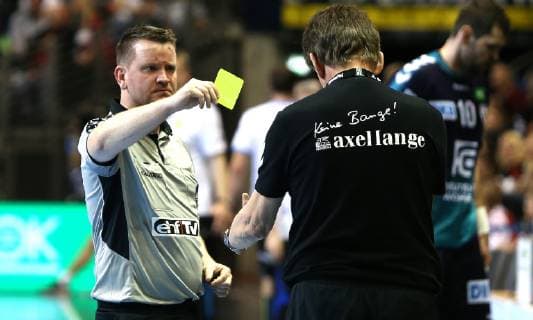 31 03 2019 Handball EHF Cup Group A 12 Matchday Foxes Berlin Balatonfüredi KSE Picture Coach Velimir Petkovic Foxes Berlin receives Yellow Card Handball EHF Cup Group A 12 Matchday Foxes Berlin Balatonfüredi KSE