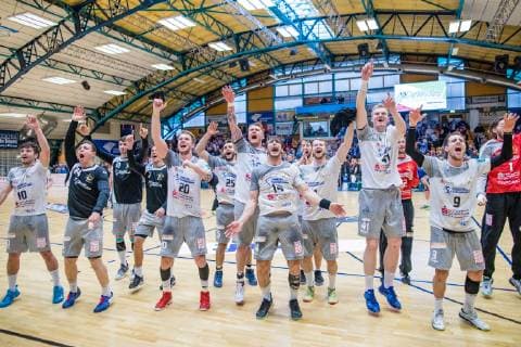 Team HC Elbflorenz 2016 cheers after 30 27 wins during the match in the Handball 2 Bundesliga Men Season 2018 2019 between Dessau Rosslauer HV 06 and HC Elbflorenz 2016 in the Anhalt Arena on 31 March 2019 in Dessau Rosslau Sachsen Anhalt Germany