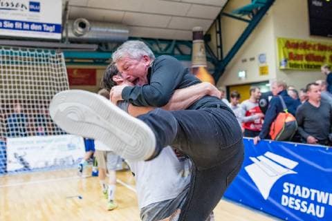 Uwe Saegeling cheering during the match in the Handball 2 Bundesliga Mens Season 2018 2019 between Dessau Rosslauer HV 06 and HC Elbflorenz 2016 in the Anhalt Arena on 31 March 2019 in Dessau Rosslau Saxony Anhalt Germany