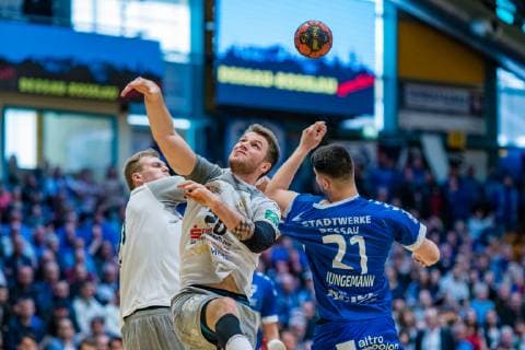 Nils Kretschmer 20 HC Elbflorenz 2016 Philip Jungemann 21 Dessau Rosslauer HV 06 Michal Kasal 41 HC Elbflorenz 2016 during the match in the Handball 2 Bundesliga Men Season 2018 2019 between Dessau Rosslauer HV 06 and HC Elbflorenz 2016 in the Anhalt Arena on 31 March 2019 in Dessau Rosslau Sachsen Anhalt Germany